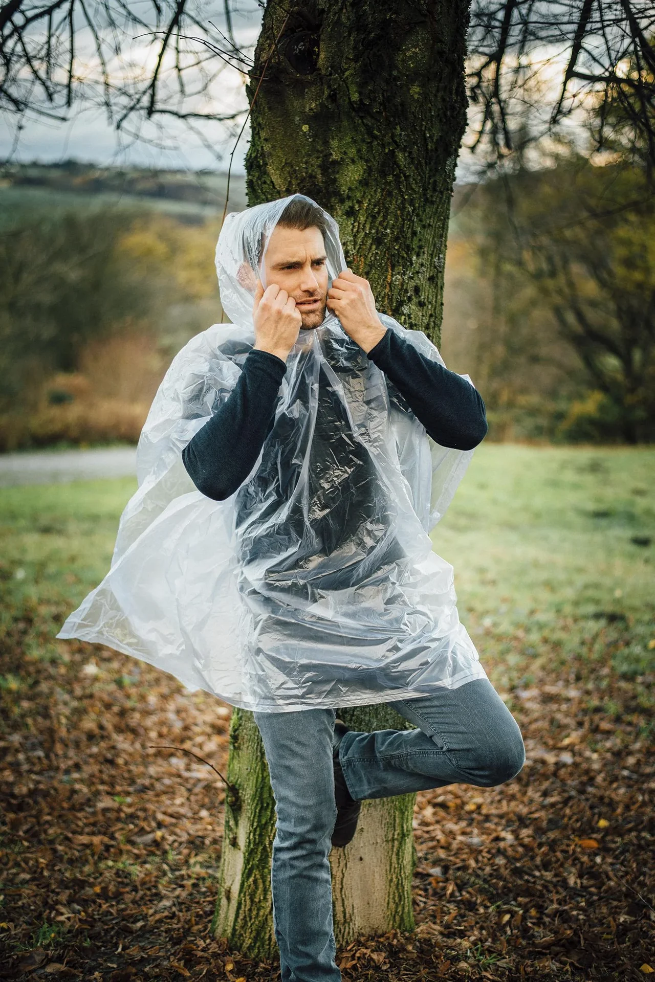 Regenponcho in Einheitsgröße, wasserfest, mit Druckknöpfen, Farbe transparent - 0