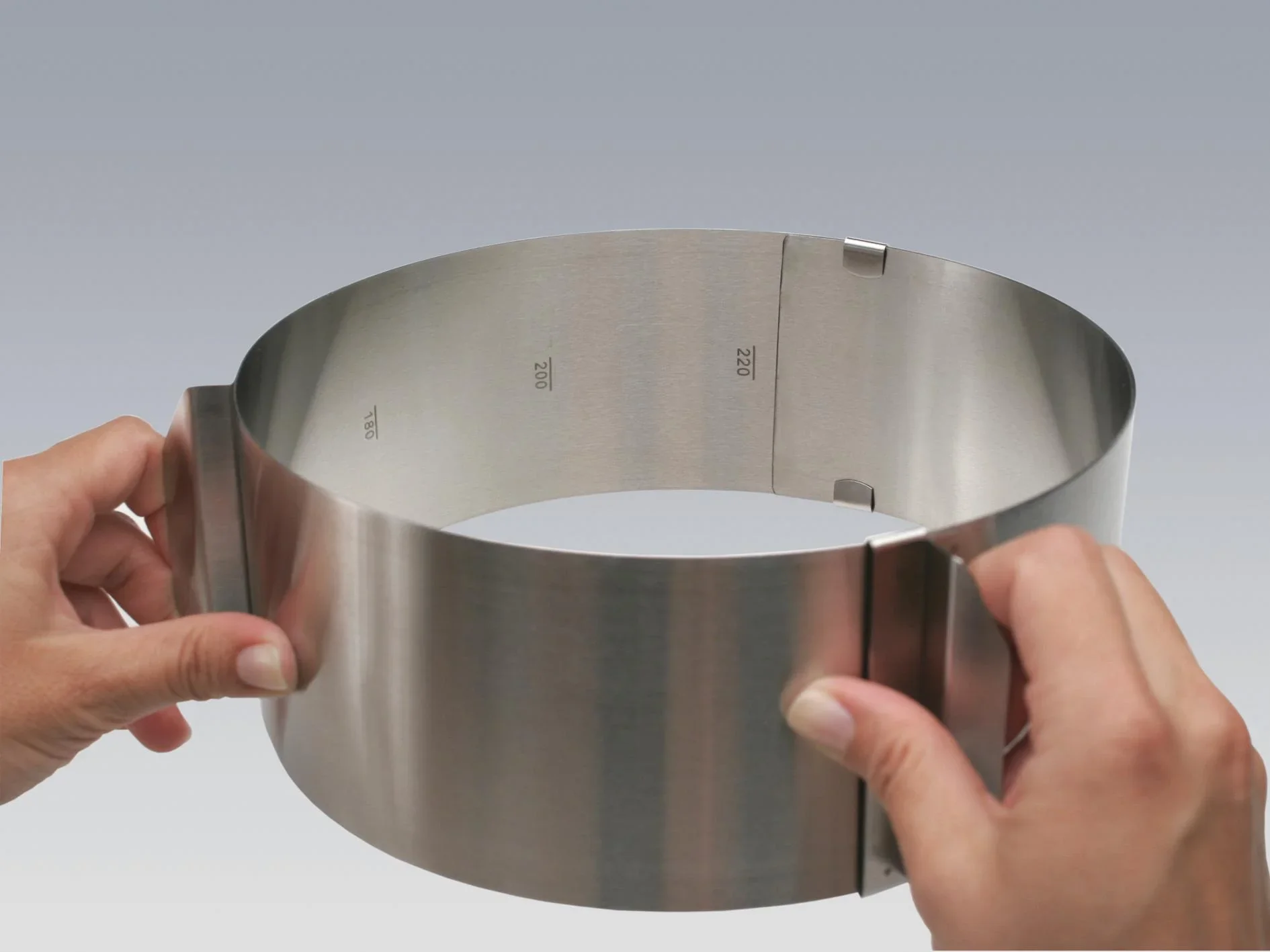 Variabler Tortenring mit Skala, von 16-30 cm - 0