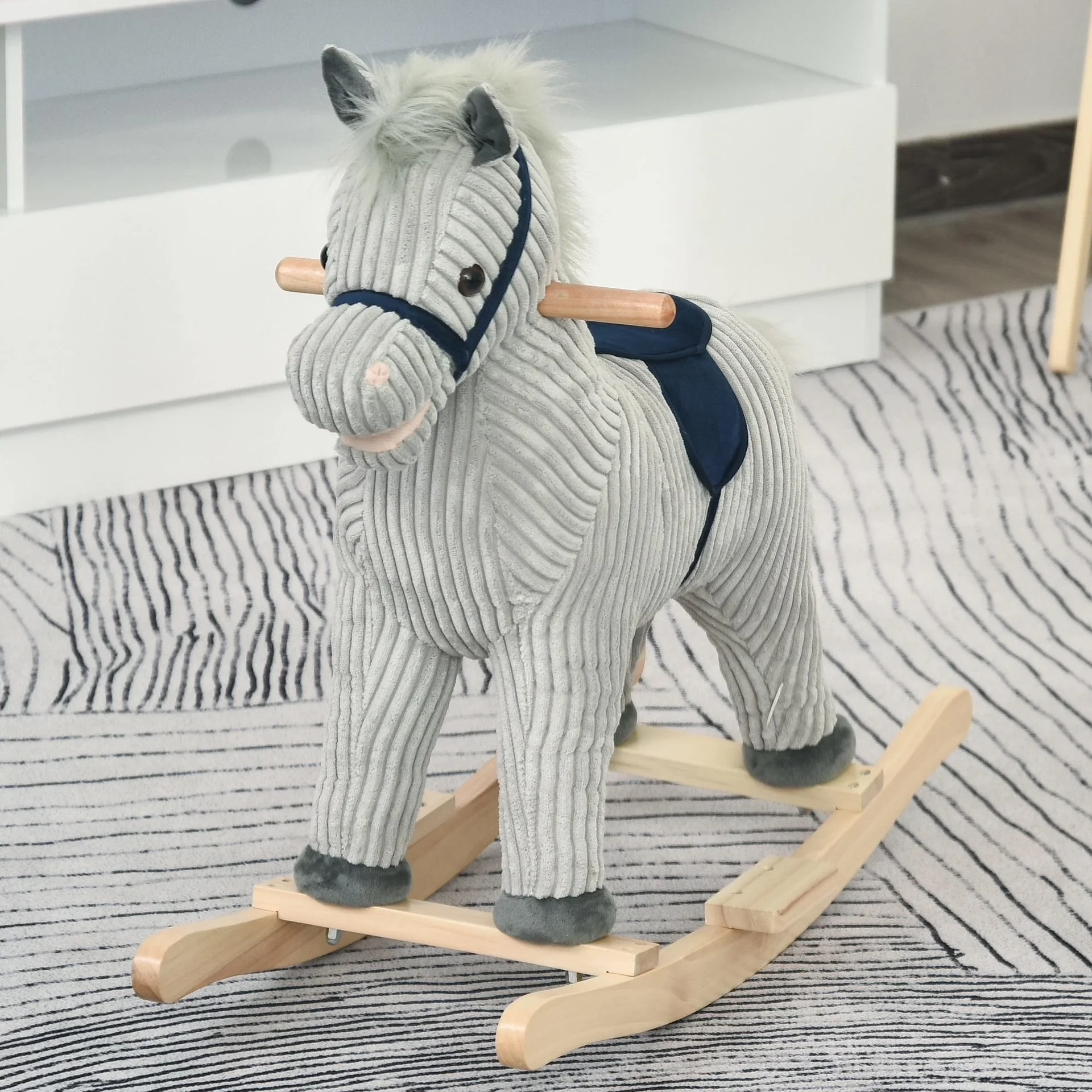 Schaukelpferd mit Tiergeräusche - 0