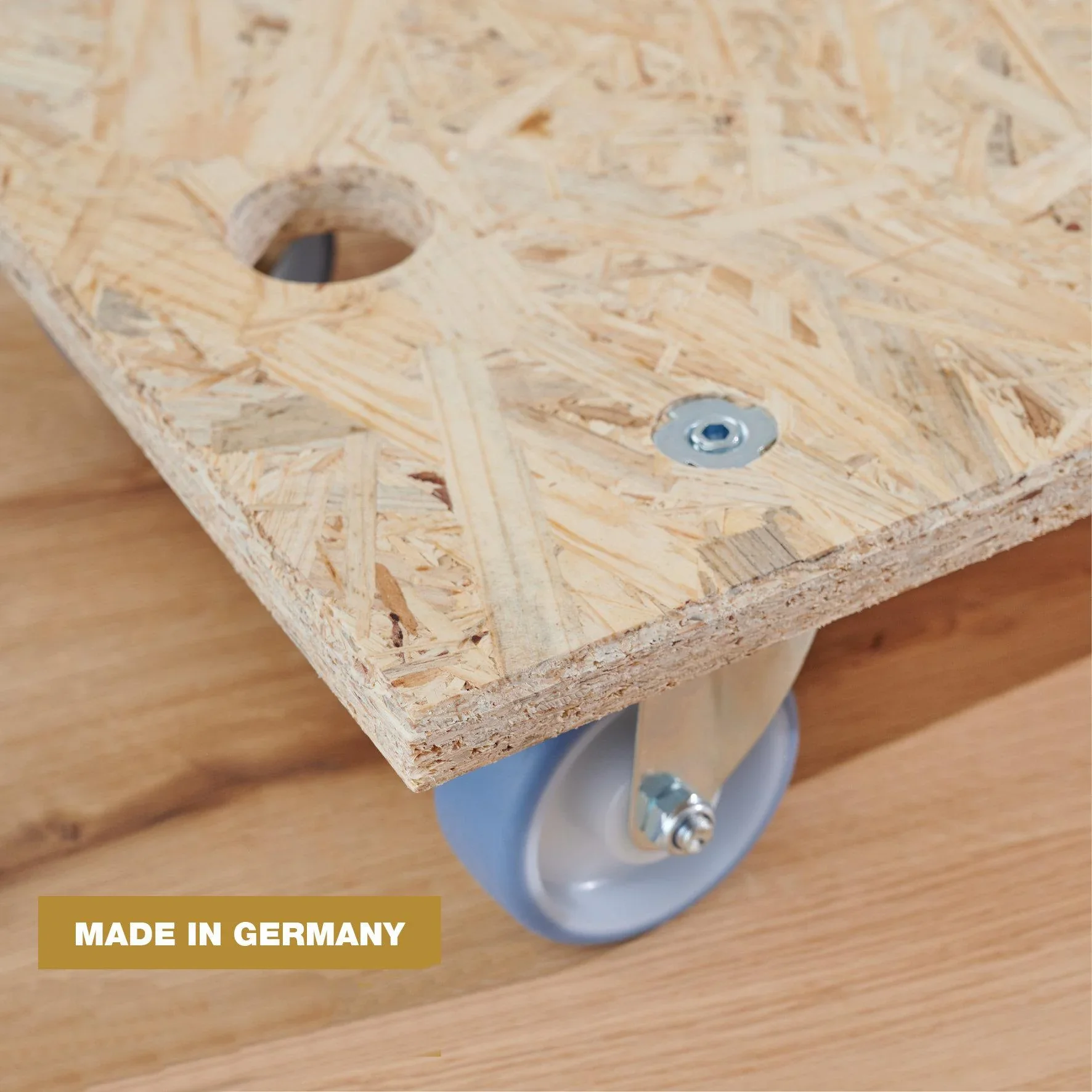 Transporthilfe MM 1173 , 57,5 x 30 x 11 mm, softe Rollen Ø 75 mm, Rollenlager, OSB Platte, CO2-neutral, Tragkraft 250 kg - 2