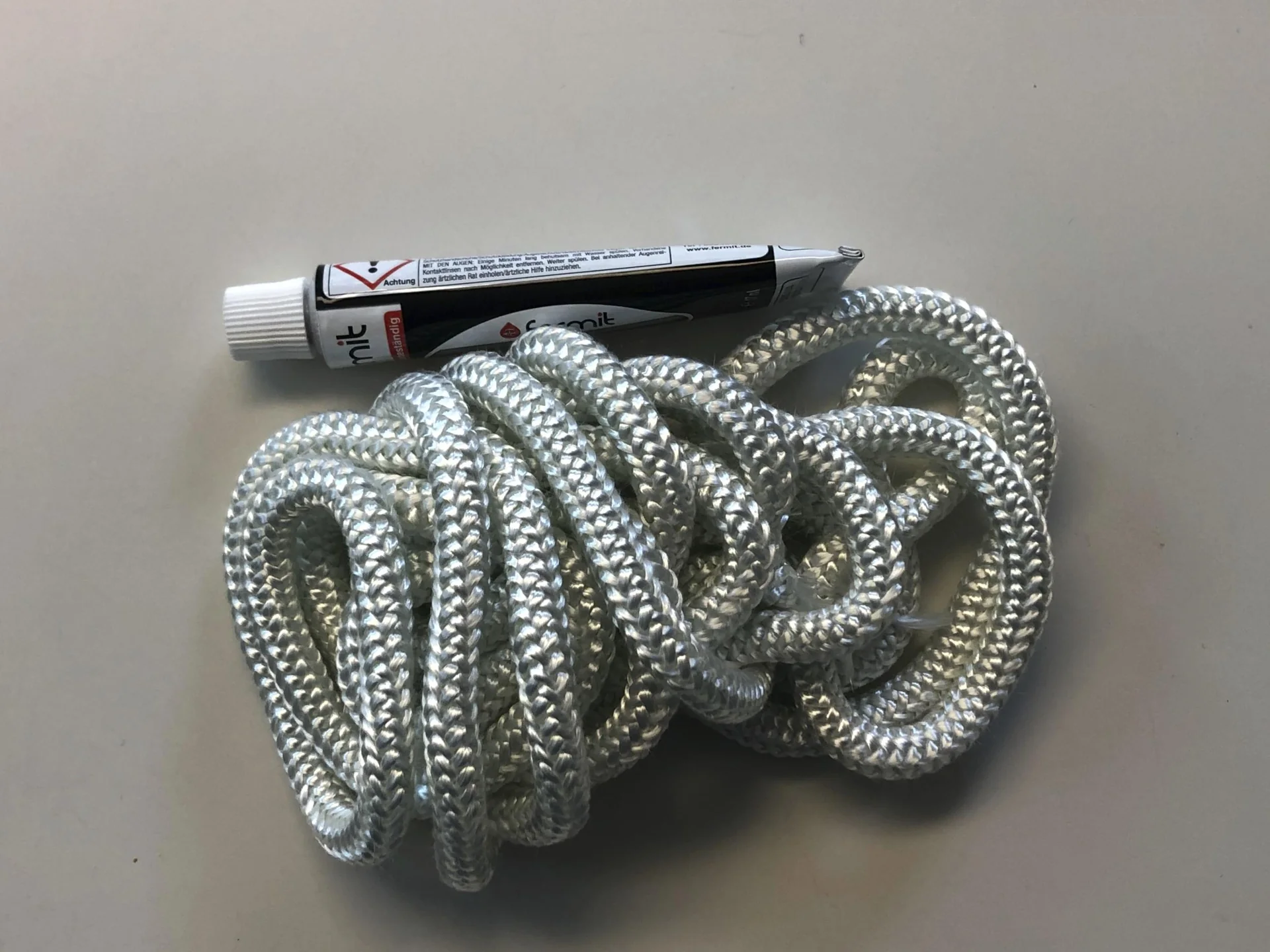 Glasfaserabdichtungsset 10 mm Durchmesser, 2,5 m lang, incl. 17 ml Kleber (Ofenabdichtung) - 2