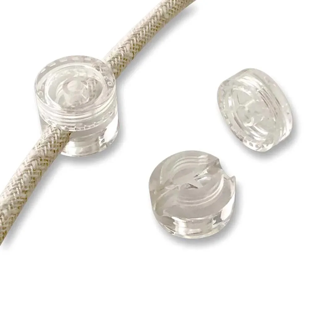 Cousin-Paul-Wandbefestigung-fuer-Nomade-Lampenkabel-transparent-467826_1.jpg