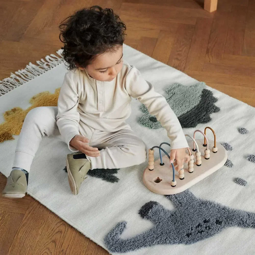 Liewood--Bent--Kinderteppich-Dino-beige-Multi-Mix-458418_1.jpg