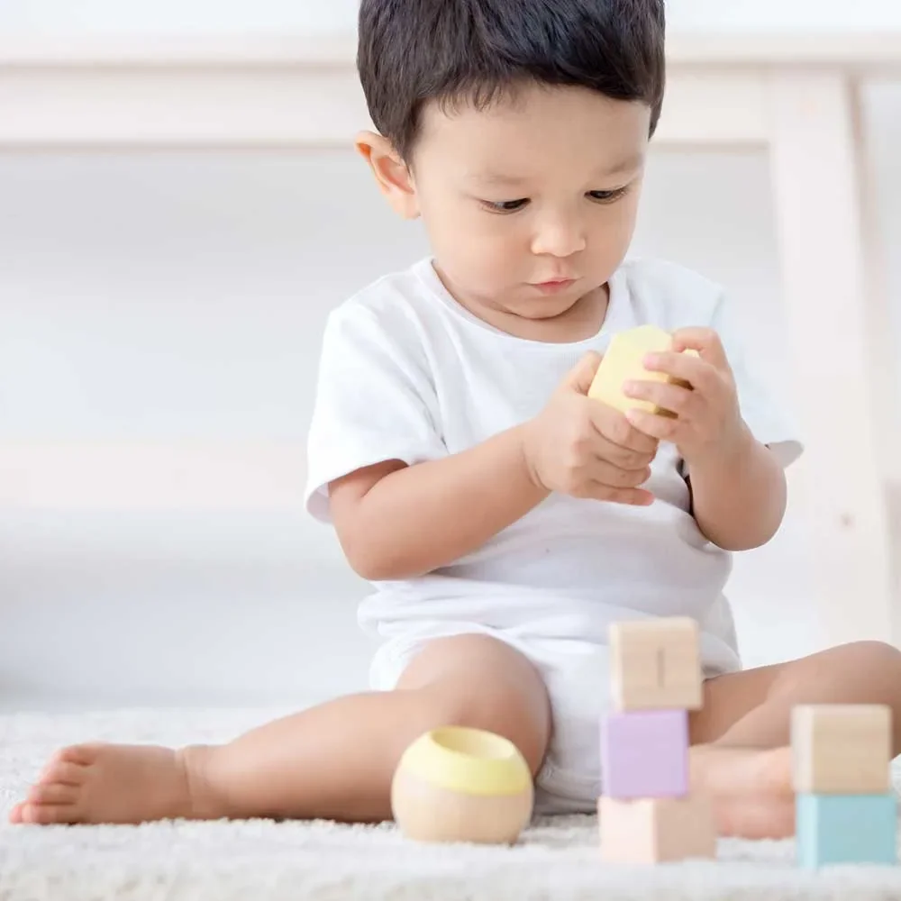 Plan-Toys-Sinneskloetze-Holz-pastell-457297_8.jpg
