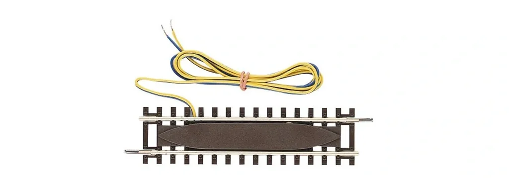 Anschlussgleis mit EMV-Entstörkondensator, Länge 115 mm (halbe Standardlänge).