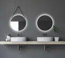 Dekorativer runder Wandspiegel mit indirekter LED Beleuchtung in gold matt Ø 50 cm