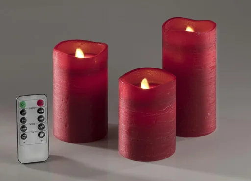 "LED Echtwachskerzen mit Timer und Flackerlicht - 3er Set in rot image"